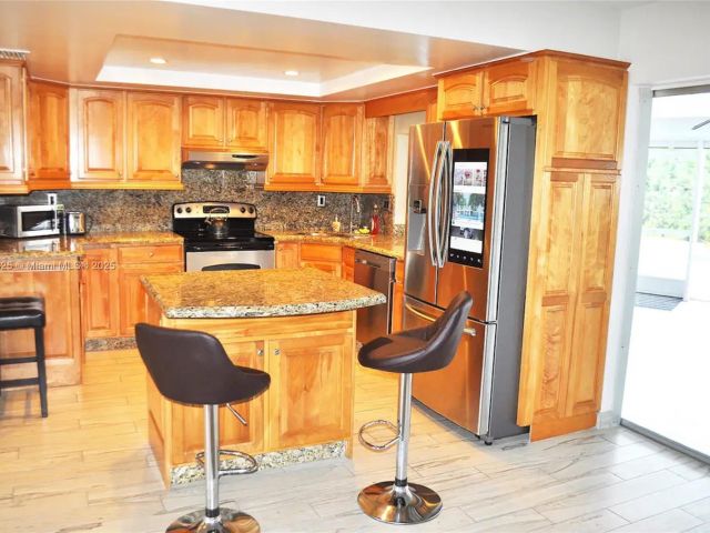 Home for sale at 5111 NE 15th Ave - photo 5979400