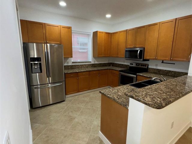 Home for sale at 1033 NE 17th Way 605 - photo 5981459