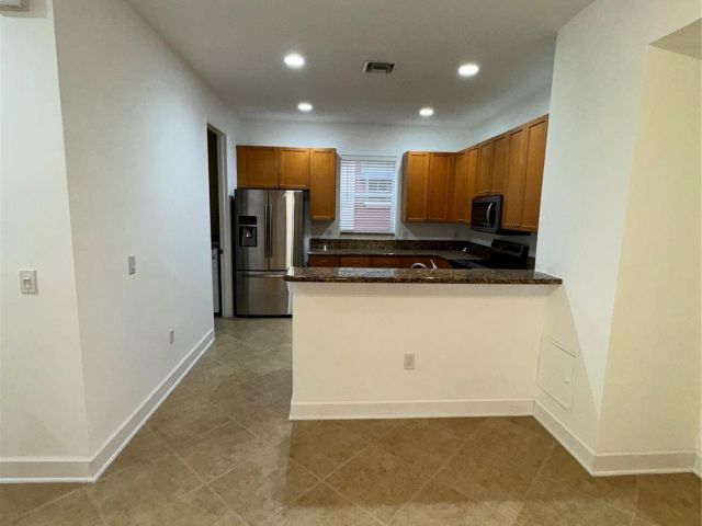 Home for sale at 1033 NE 17th Way 605 - photo 5981460