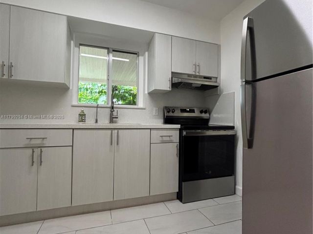 Home for sale at 1575 SW 12th Ave - photo 6112755