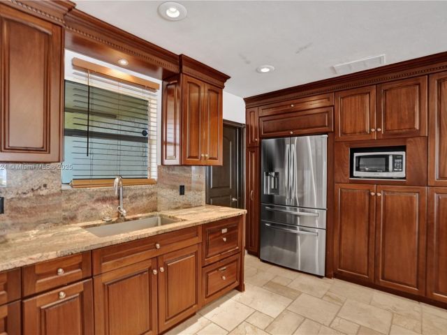 Home for rent at 3100 NE 56th Ct - photo 6075660