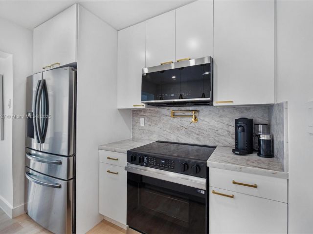 Home for rent at 12325 NE 11th Pl - photo 6079259