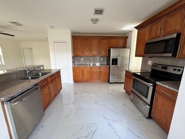 Home for sale at 1720 NE 35th Ave - photo 6113431