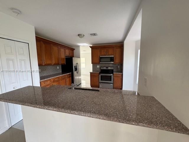 Home for sale at 1720 NE 35th Ave - photo 6113432