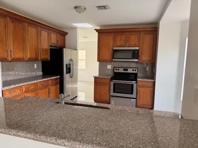 Home for sale at 1720 NE 35th Ave - photo 6113433