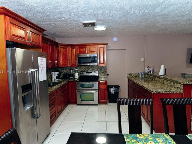 Home for rent at 240 NW 197th St 1 - photo 6148688
