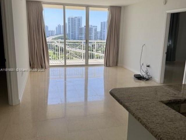 2-bedroom condo for rent in Aventura - 19501 W Country Club Dr 1815 - MondialRealty