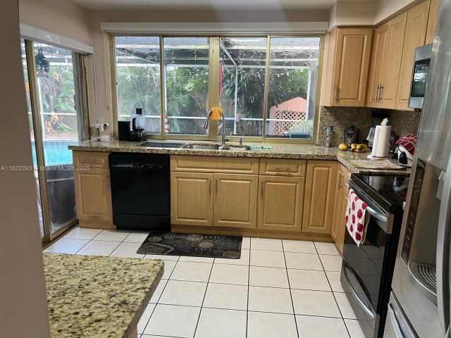 Home for sale at 7110 SW 11th St - photo 6160469