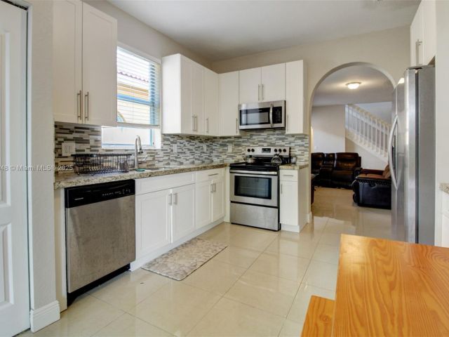 Home for sale at 2131 NE 37th Rd - photo 6224502