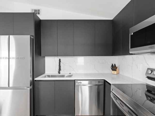 Home for sale at 309 SE 3rd Ave - photo 6178456