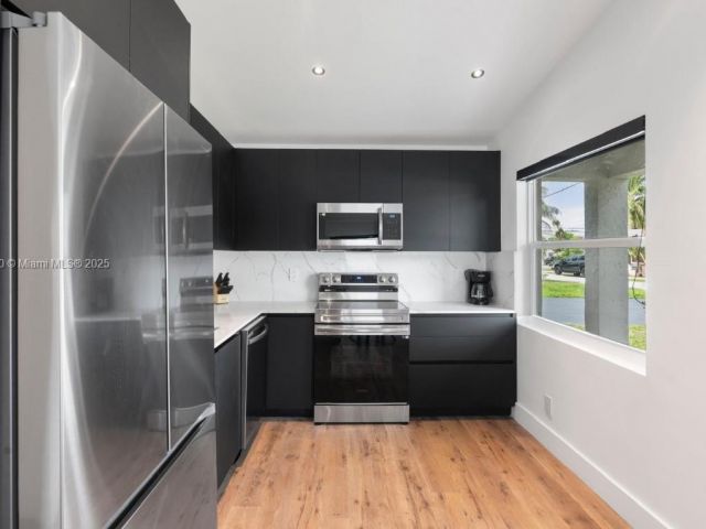 Home for sale at 309 SE 3rd Ave - photo 6178457