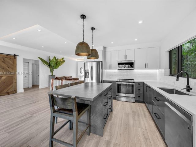 Home for rent at 861 NE 74th St - photo 6175539