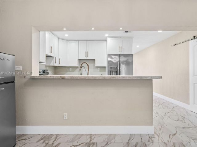 Home for sale at 919 NE 4th St - photo 6194574