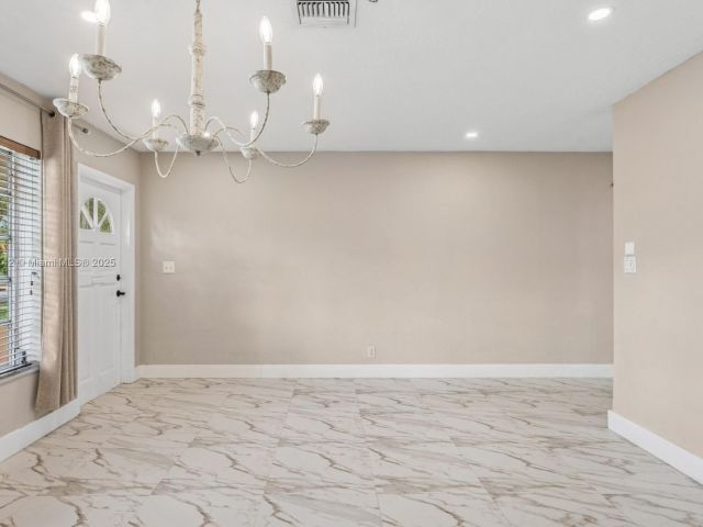 Home for sale at 919 NE 4th St - photo 6194579