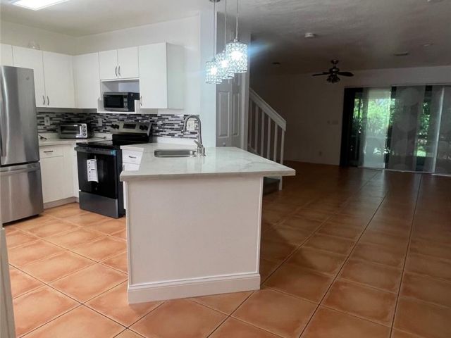 Home for rent at 1432 SW 47 Ave 1432 - photo 6192174