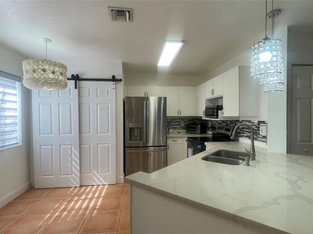 Home for rent at 1432 SW 47 Ave 1432 - photo 6192176