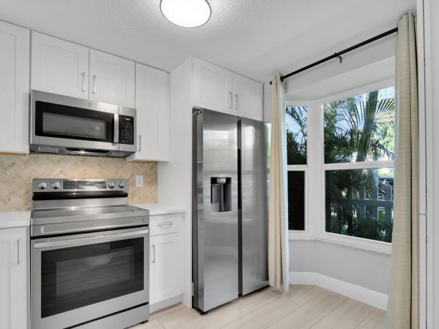 Home for sale at 1869 NE 15th Ave 1869 - photo 6196000