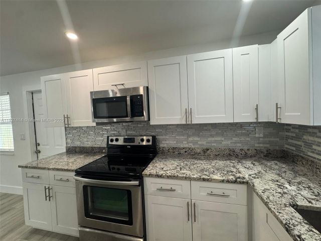 Home for sale at 1657 SW 44th Ave - photo 6198478