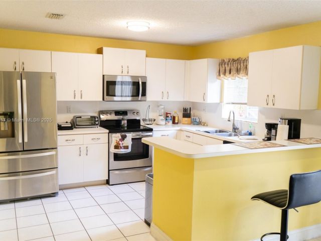 Home for sale at 13402 SW 153rd St 1904 - photo 6206854