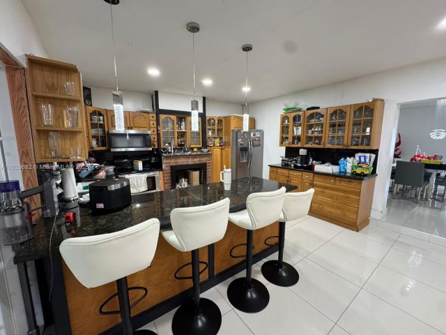 Home for sale at 12841 SW 54th St #1 - photo 6210173