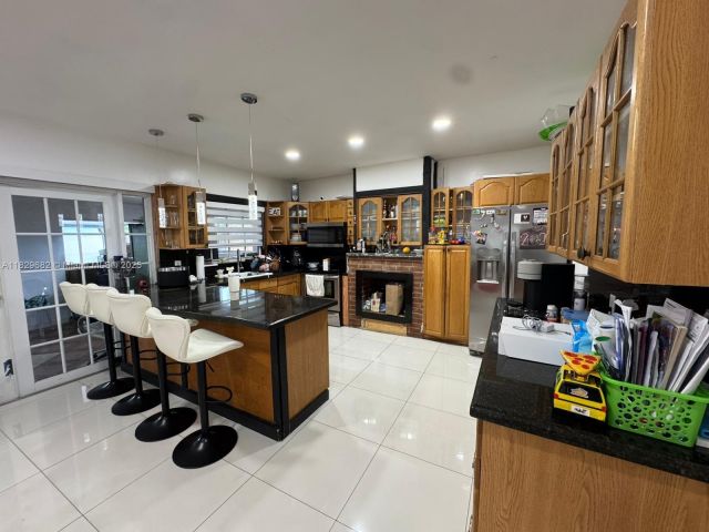 Home for sale at 12841 SW 54th St #1 - photo 6210174