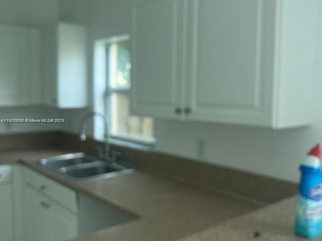 Home for rent at 4113 NE 24th Dr 4113 - photo 6239529