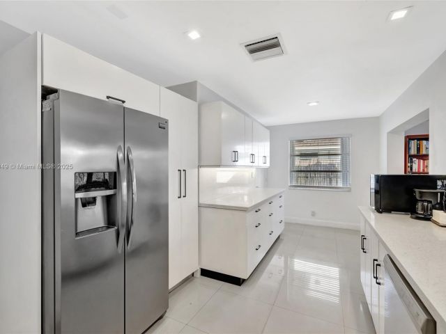 Home for sale at 2261 NE 62nd St - photo 6244139