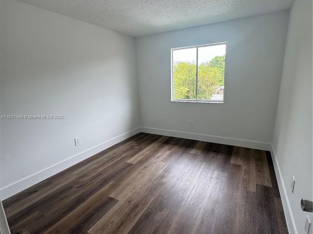 Home for rent at 157 NE 12th Ave 157 - photo 6264922
