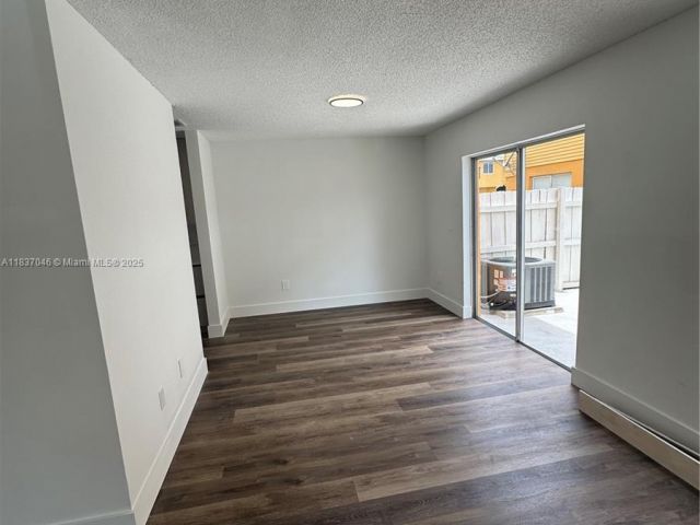 Home for rent at 157 NE 12th Ave 157 - photo 6264929