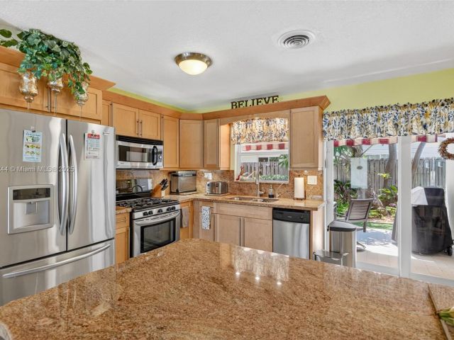 Home for sale at 5555 NE 20th Ter - photo 6285424