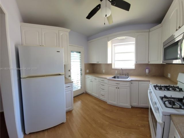 Home for rent at 828 NE 76th St - photo 6271749