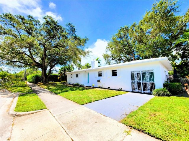 Home for rent at 828 NE 76th St - photo 6271757