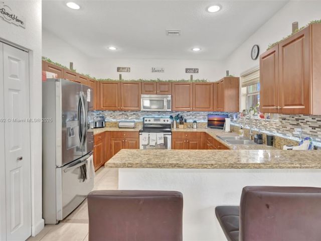 Home for sale at 216 NE 36th Ter - photo 6276700