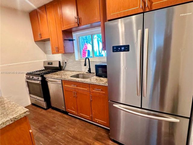 Home for rent at 9065 Harding Ave D2 - photo 6279614