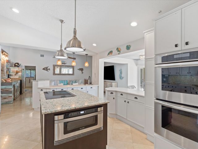 Home for sale at 830 NE Boca Bay Colony Drive - photo 6318813