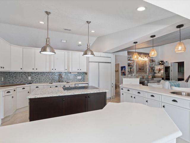 Home for sale at 830 NE Boca Bay Colony Drive - photo 6318814