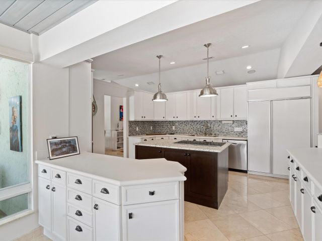 Home for sale at 830 NE Boca Bay Colony Drive - photo 6318815