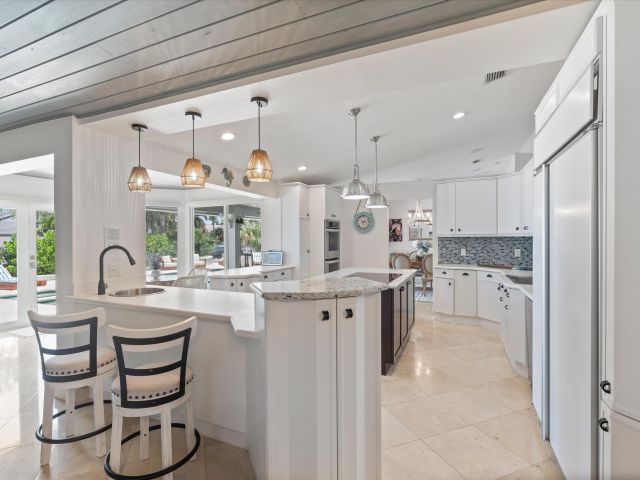 Home for sale at 830 NE Boca Bay Colony Drive - photo 6318816