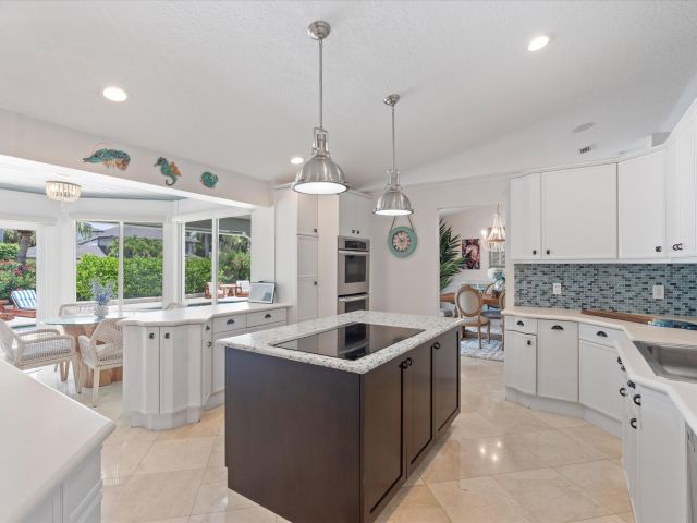 Home for sale at 830 NE Boca Bay Colony Drive - photo 6318817