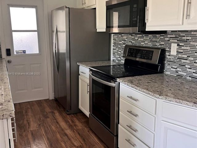 Home for sale at 1321 NE 43rd Ct - photo 6282775