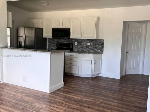 Home for sale at 1321 NE 43rd Ct - photo 6282776