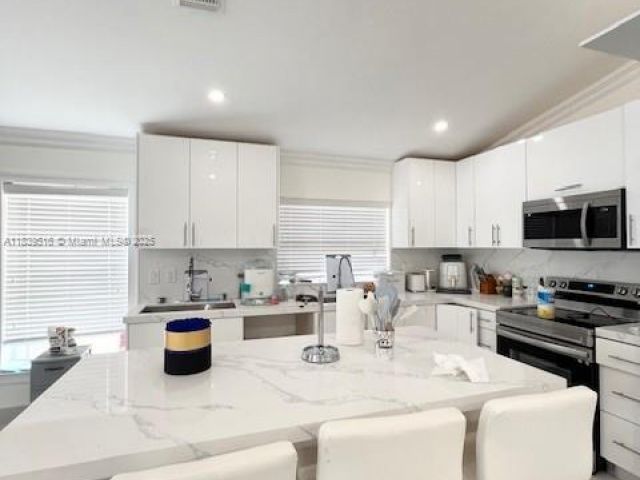 Home for sale at 4966 SW 33rd Ter - photo 6292428