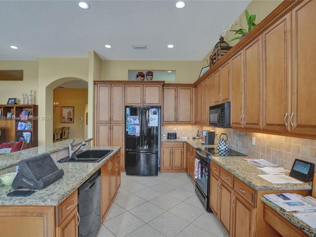 Home for sale at 13648 Venice Beach Pt - photo 6286879