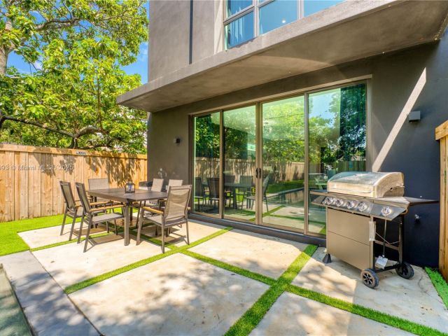 Home for rent at 58 NW 52nd St 58 - photo 6289303