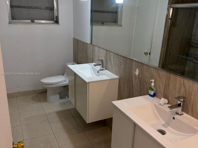 Home for rent at 301 186th St - photo 6291927