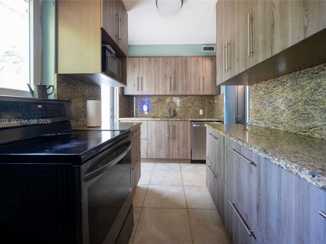 Home for sale at 13325 NE 10th Ave - photo 6333608