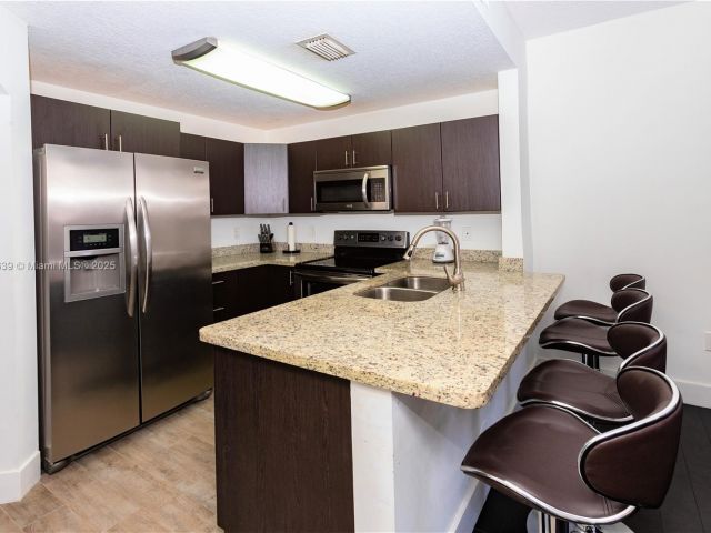 Home for rent at 6202 NW 116th Ave 449 - photo 7437611