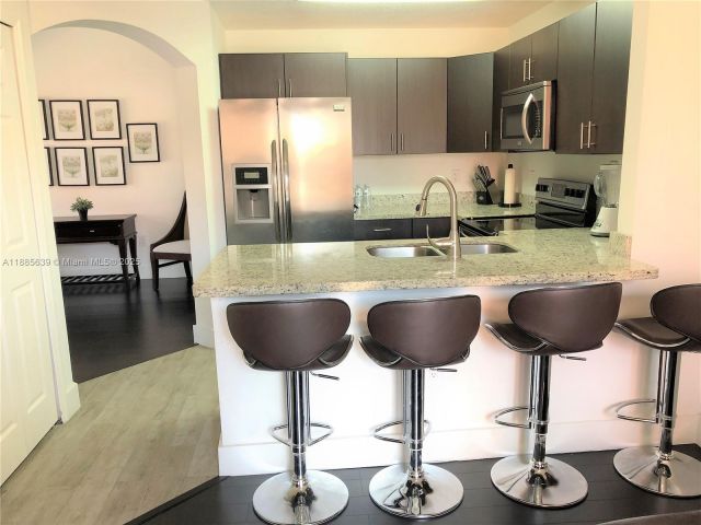 Home for rent at 6202 NW 116th Ave 449 - photo 7437614