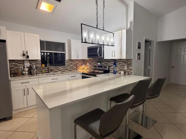 Home for rent at 13530 52nd Court N - photo 6628541