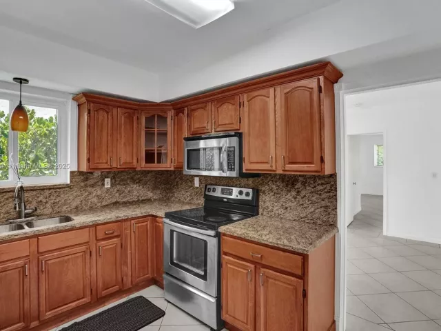 3-bedroom home for rent in Surfside - 8851 Byron Ave - MondialRealty